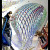 Workers install Three Fold, which hangs from the ceiling of the second floor of the Li Ka Shing Center for Learning and Knowledge. The sculpture, by artist Alyson Shotz, was dedicated May 21.