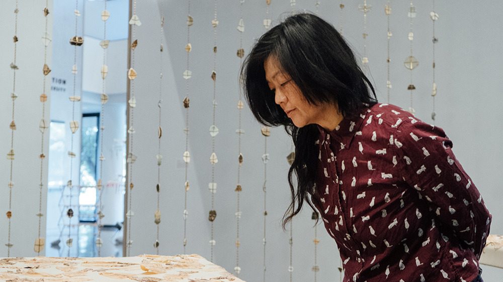 Artist Patty Chang at the Anderson Collection, where pottery fragments, archival materials, and descendants’ stories shed light on a Chinese fishing village. | Image and video by Taylor Jones