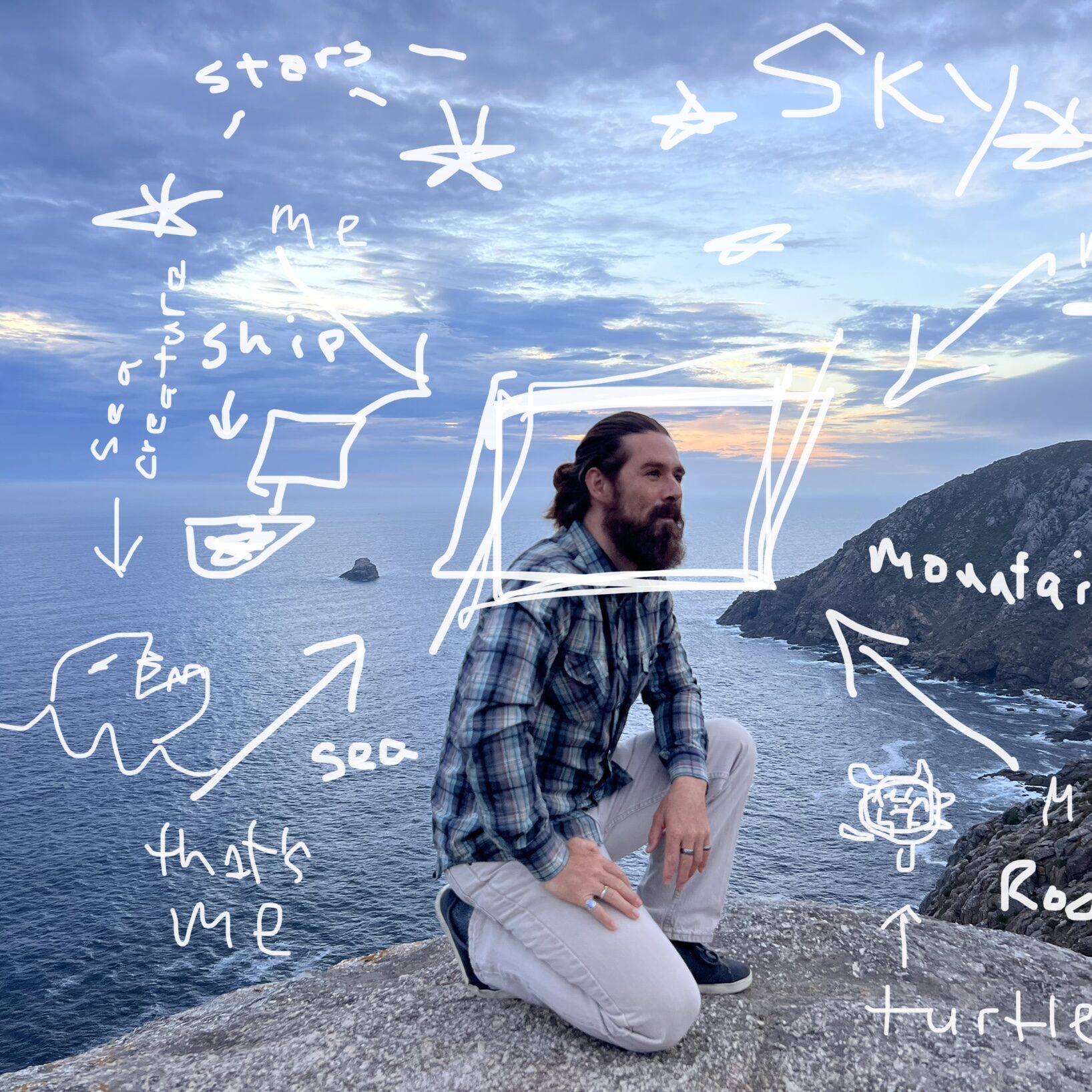 A photo of Adam Chin kneeling in a blue plaid shirt and jeans on a cliff ledge overlooking the ocean. There are white pencil doodles around him.