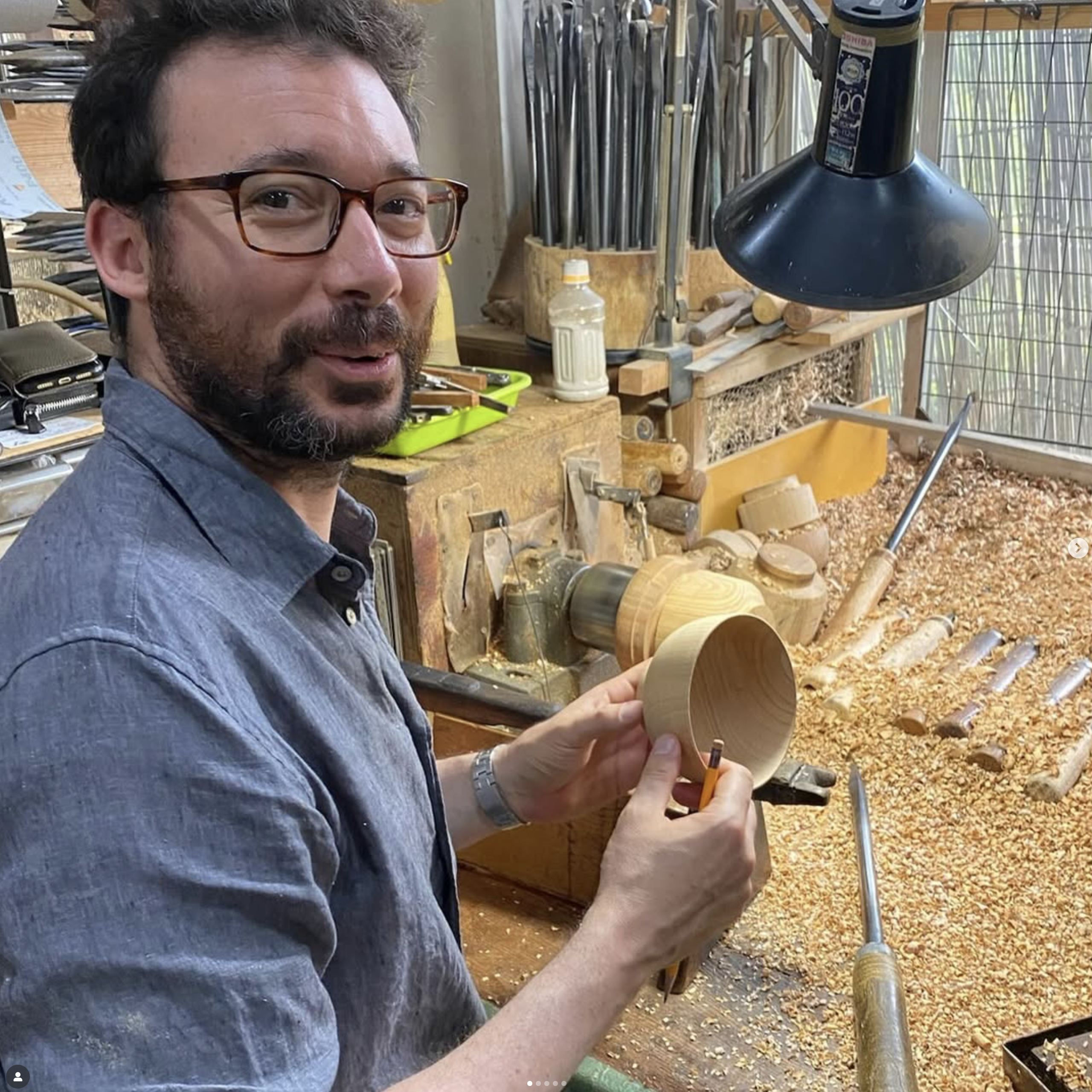 A photo of Ariel Stilerman while woodworking
