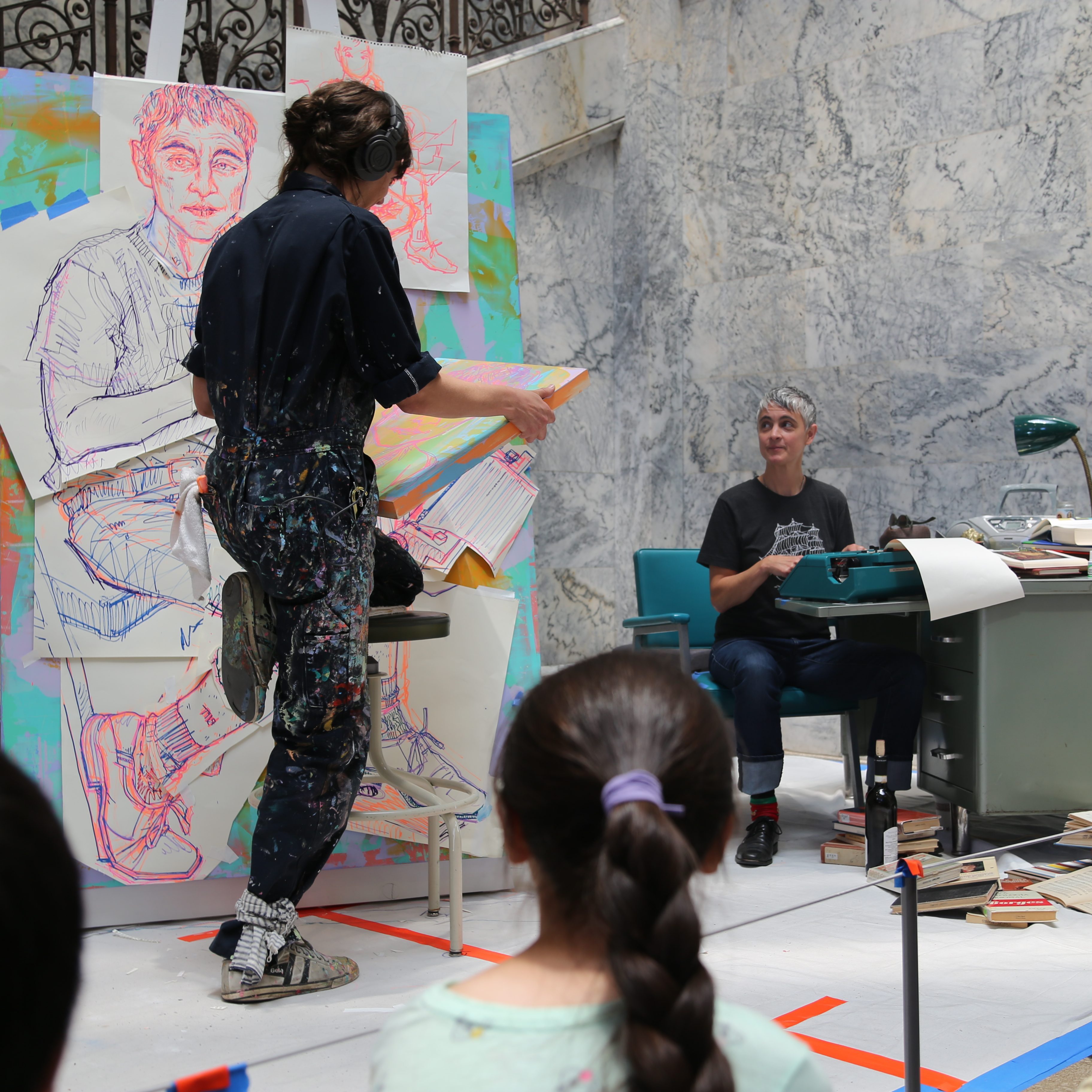 Visiting Artist painting in Cantor Atrium