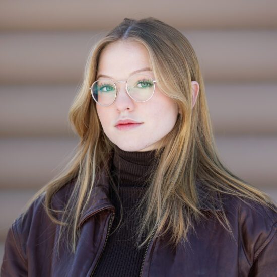 Photo of Keona in a brown jacket