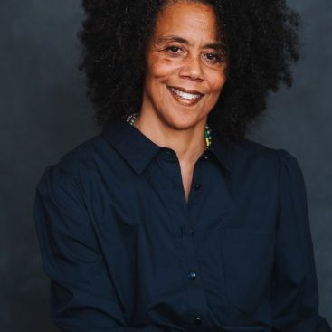 A person smiling towards the camera