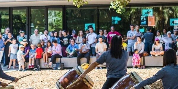 Taiko drummers in front of Anderson Collection