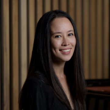 Photo of Elizabeth Schumann in a black blazer
