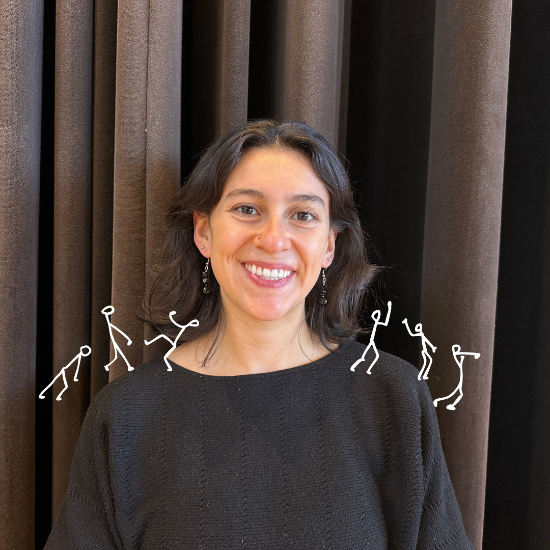 A photo of Isabella standing in front of a dark curtain, with doodles of tiny white stick figures dancing on her shoulders