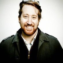 Photo of Michael Rau in a black jacket