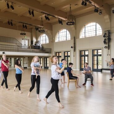 Students run through a rehearsal of the dance elements in the play "Spring Awakening, the Musical," in the newly refurbished Roble Dance Studio.